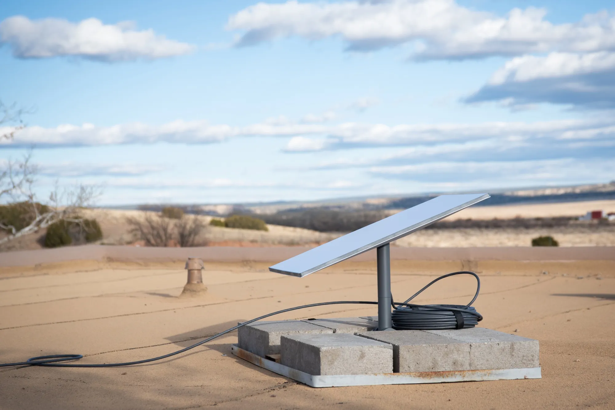 A Starlink satellite on the roof of a home in Galisteo, New Mexico, 