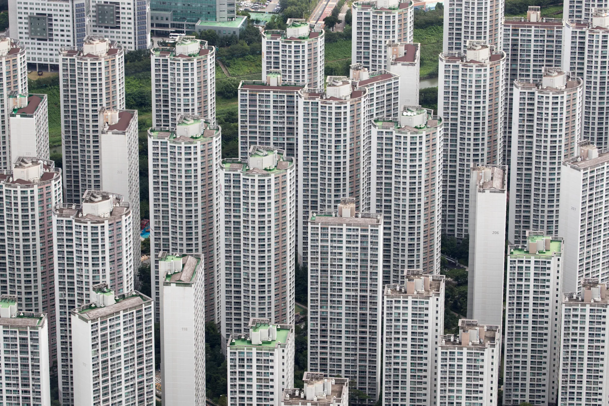 Residential apartment buildings are seen from the Seoul Sky observation deck of the Lotte Corp. World Tower in Seoul, South Korea, on Friday, Aug. 11, 2017. South Korea's stocks and currency fell after President Donald Trump warned North Korea that if it "does anything" to the U.S. or its allies "things will happen to them like they never thought possible."