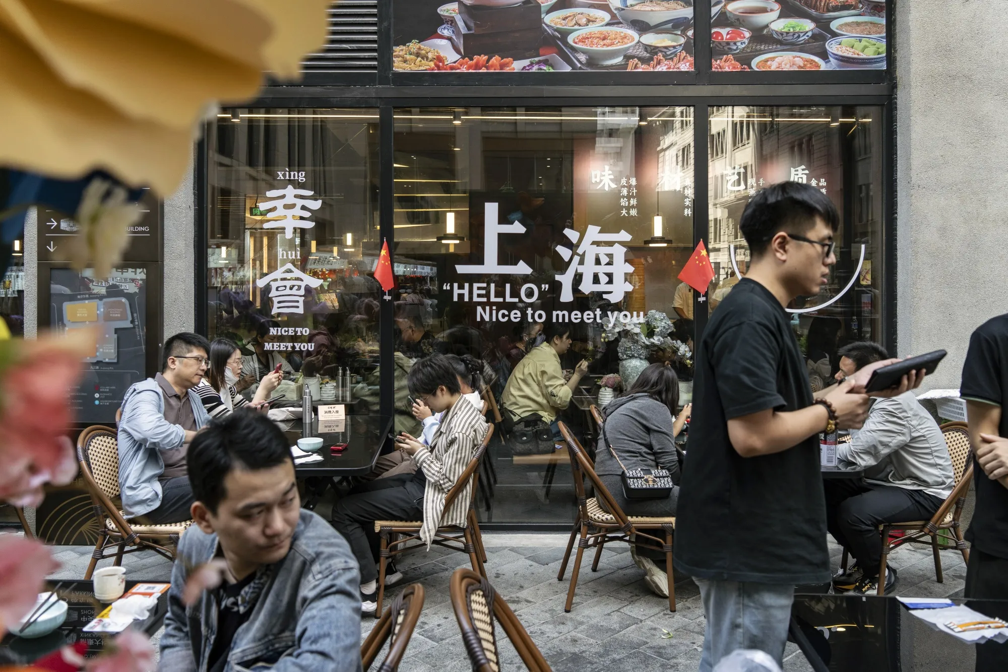 Customers at a restaurants on Nanjing East Road in Shanghai, China, on Wednesday, Oct. 2, 2024.