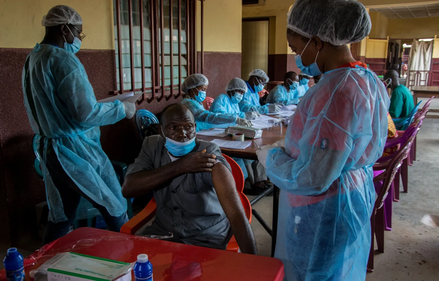 Anti-ebola vaccinations are administered at a hospital in N'zerekore, Guinea, in February.
