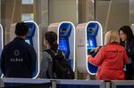 Travelers use Clear Plus kiosks at San Francisco International Airport on Thursday.