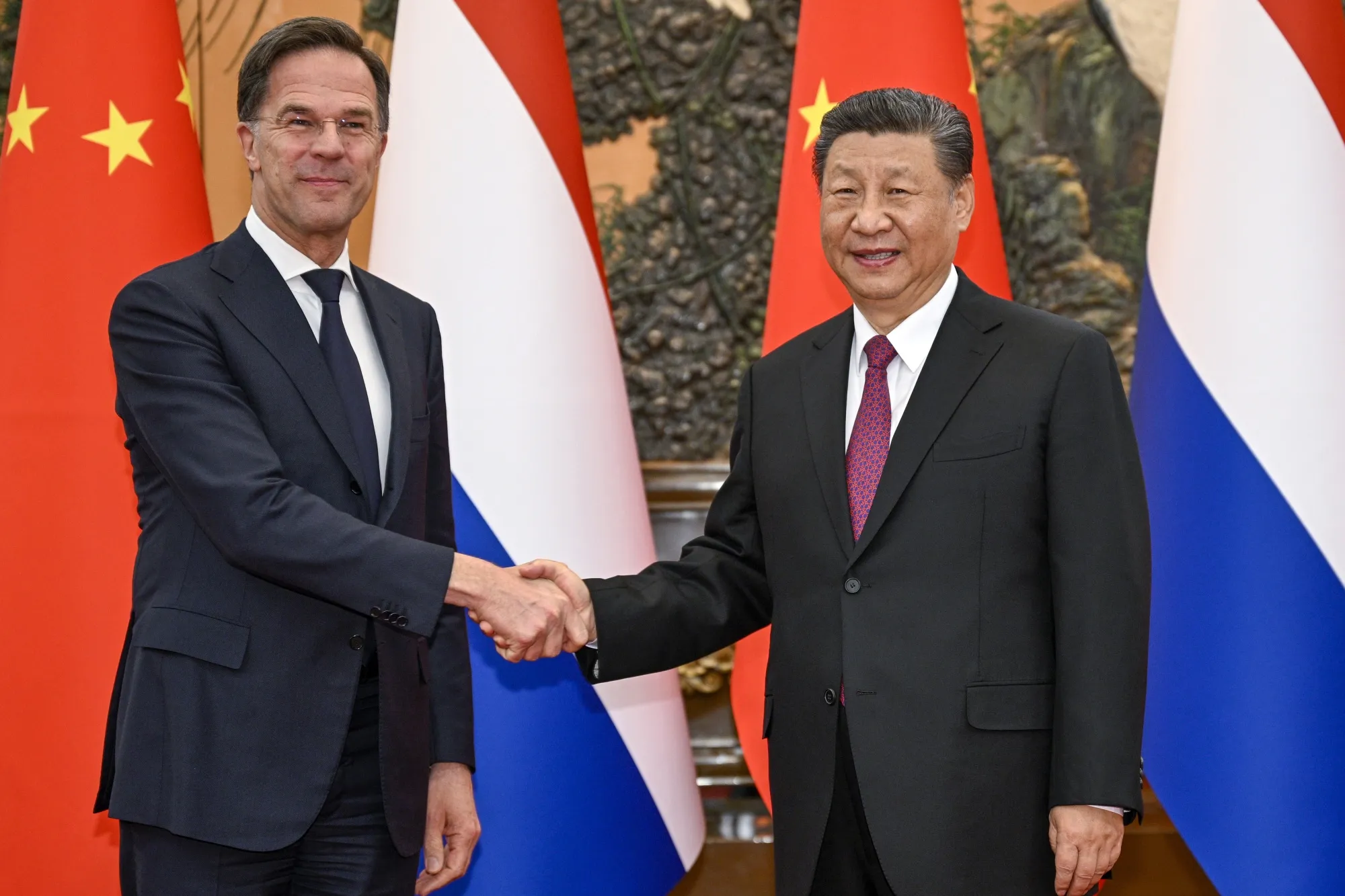 Mark Rutte and Xi Jinping in Beijing on March 27.