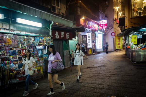 Tourists in Macau During China's Labor Holiday as China Rolls Out New Travel Permits