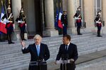 Boris Johnson, left, and Emmanuel Macron in Paris on Aug. 22.