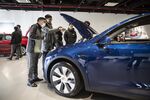 Inside a Tesla Showroom in Shanghai As Carmaker Prolongs Model Y China Delivery Times
