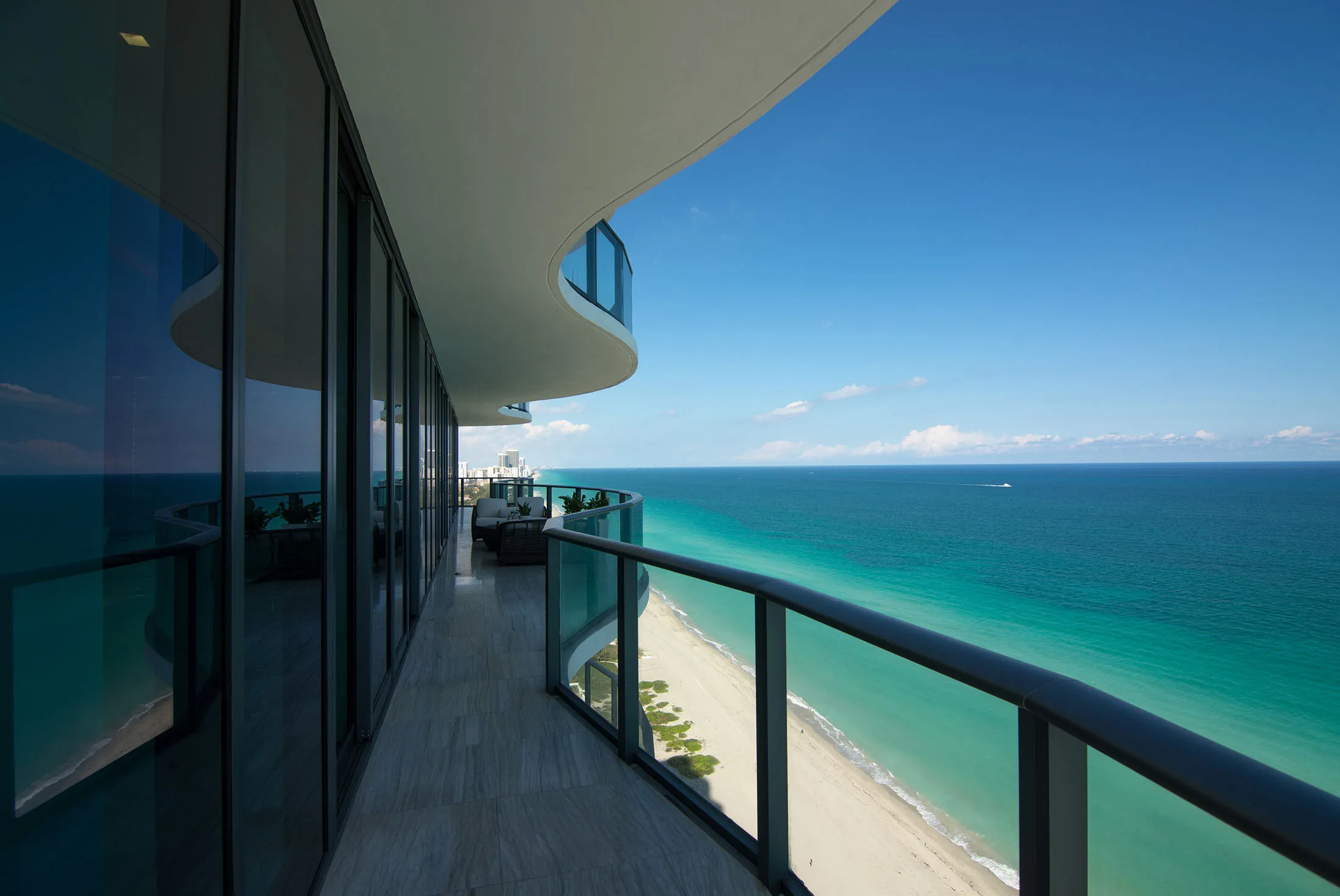 Views of the ocean and beach are seen from a luxury condominium in Miami Beach, Florida.