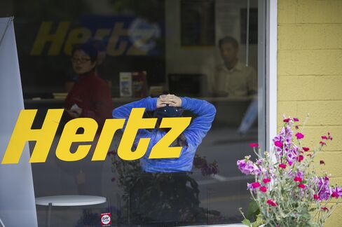Hertz’s Dollar Buyout Delays High-Grade Goals