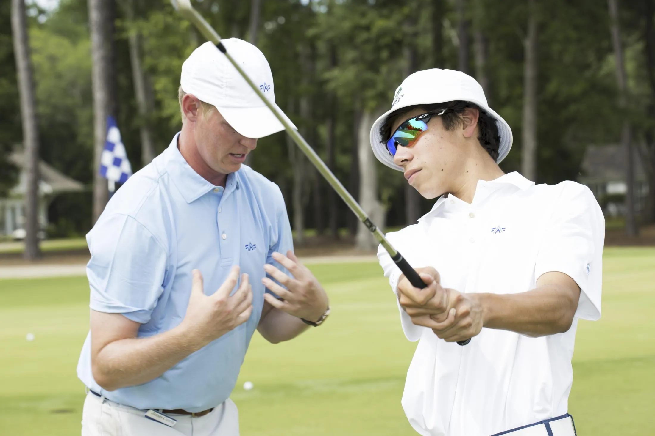 An ambassador giving tips to a student.