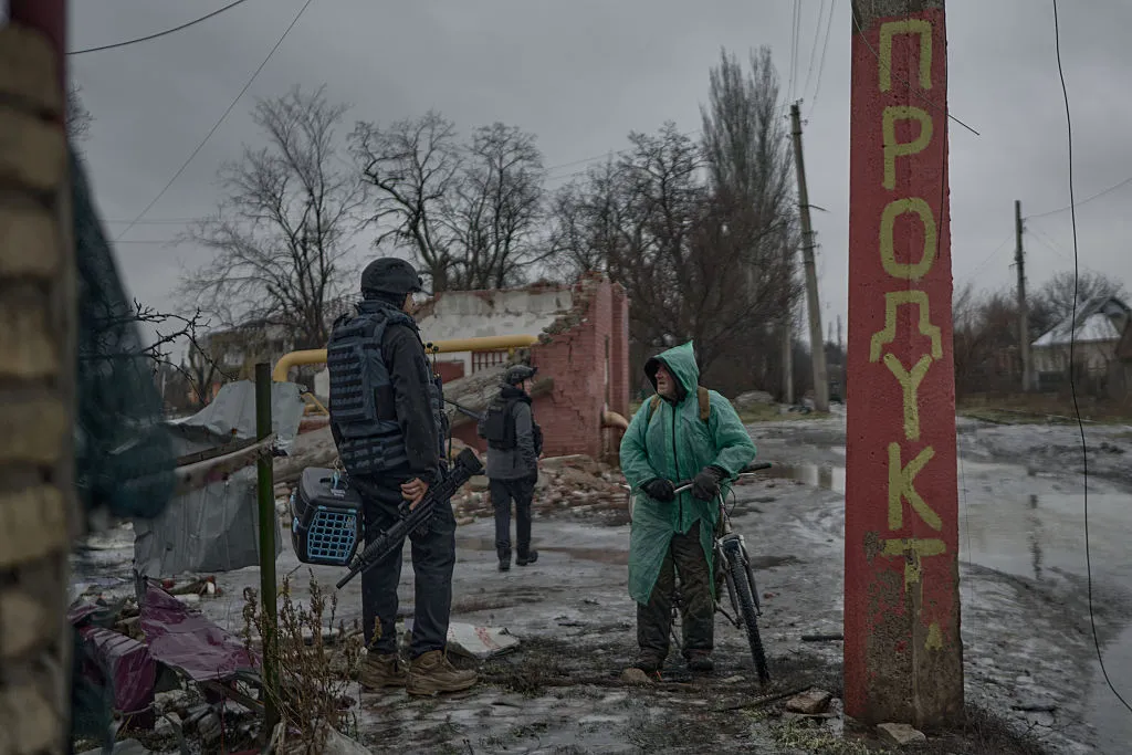 Volunteers speak with&nbsp;local residents near damaged residential buildings as Russian shelling continues to impact civilian infrastructure and evacuation efforts intensify, in&nbsp;Kostyantynivka, Ukraine.
