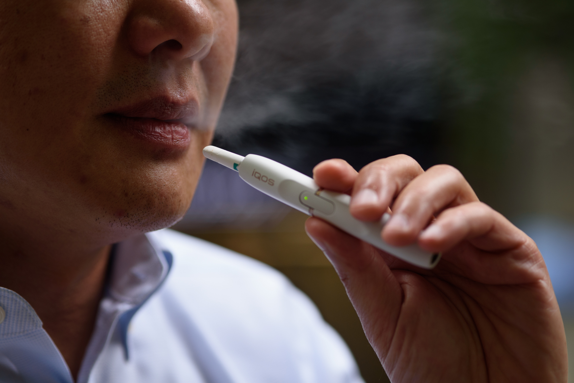 Fight for New Cigarette Substitute Heats Up Japan QuickTake Q A