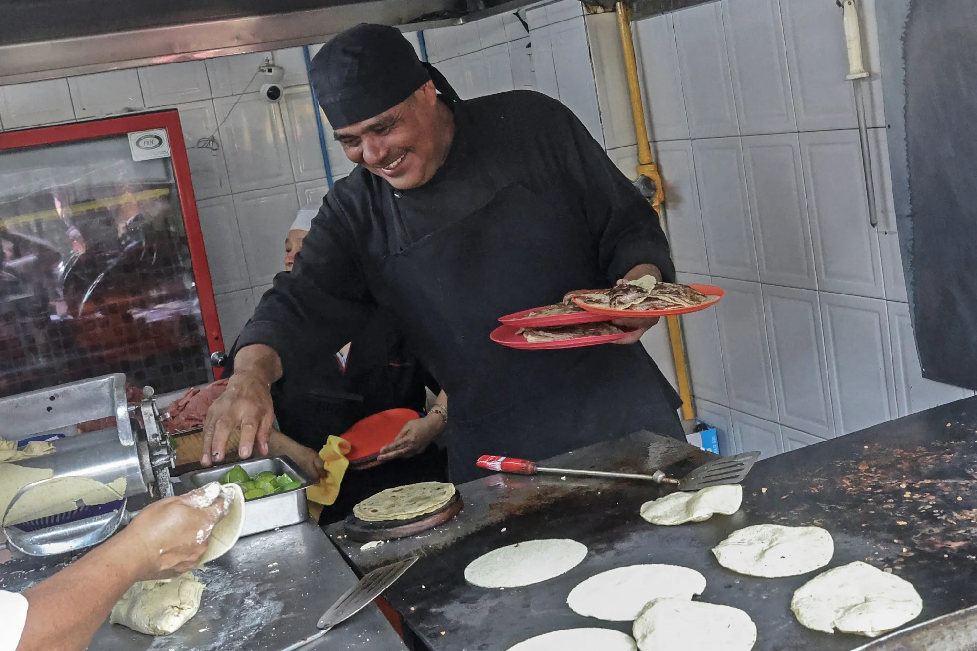 Chef Arturo Rivera Martinez prepares tacos at Taqueria El Califa de Leon restaurant in Mexico City on May 15.