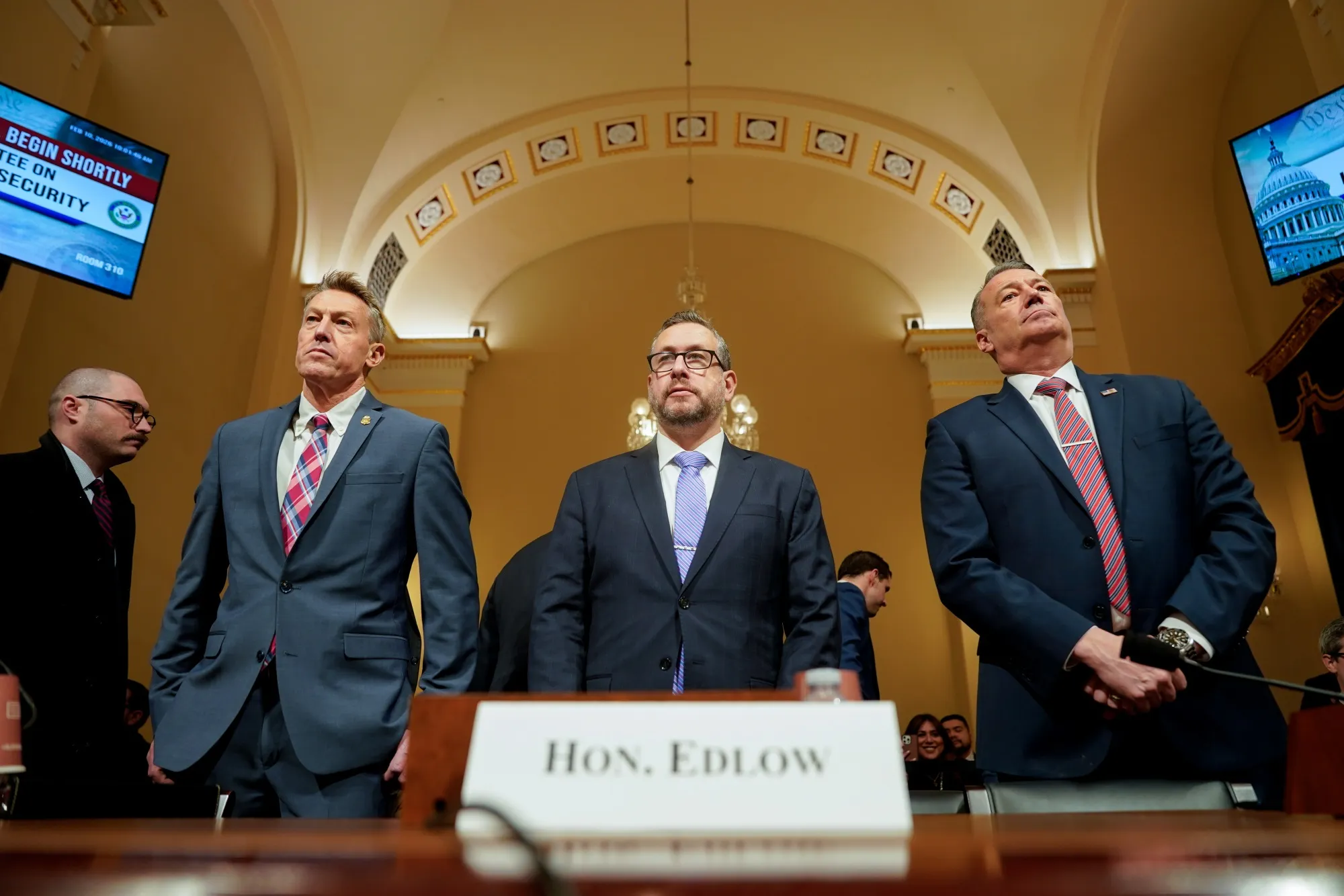 Rodney Scott, from left, Joseph Edlow, and Todd Lyons arrive for a House Homeland Security Committee hearing in Washington on Feb. 10.