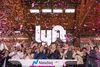 Confetti falls as John Zimmer, co-founder and president of Lyft Inc., center left, and Logan Green, co-founder and chief executive officer of Lyft Inc., center right, ring the opening bell during the company's initial public offering (IPO) at Lyft's new service center in Los Angeles, California, U.S., on Friday, March 29, 2019. Demand for Lyft Inc. shares has lifted the value of the combined stake of its co-founders to $1.2 billion.
