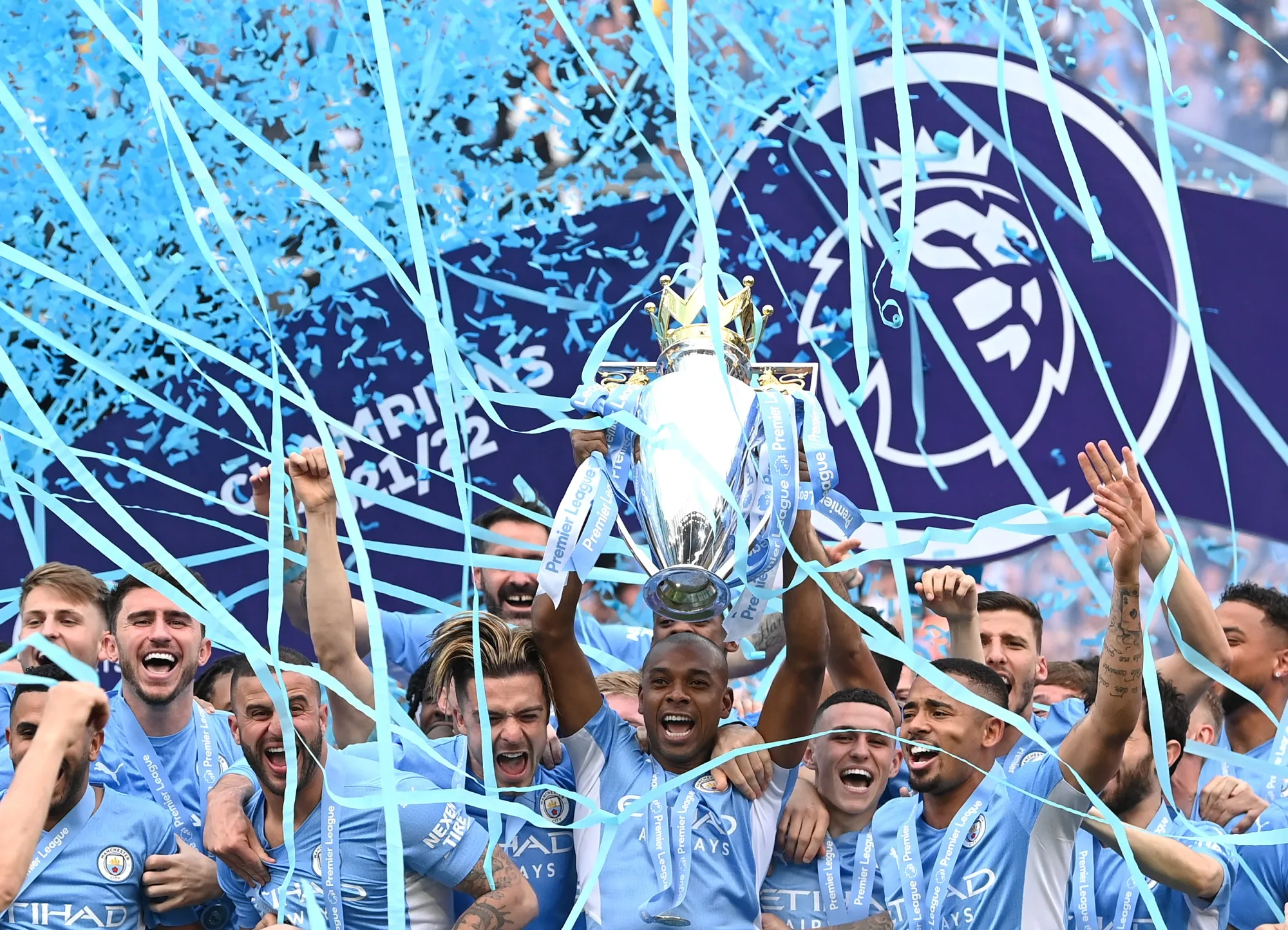 Manchester City captain Fernandinho lifts the Premier League Trophy and celebrates with the squad after the Premier League match between Manchester City and Aston Villa at Etihad Stadium in Manchester, in May.