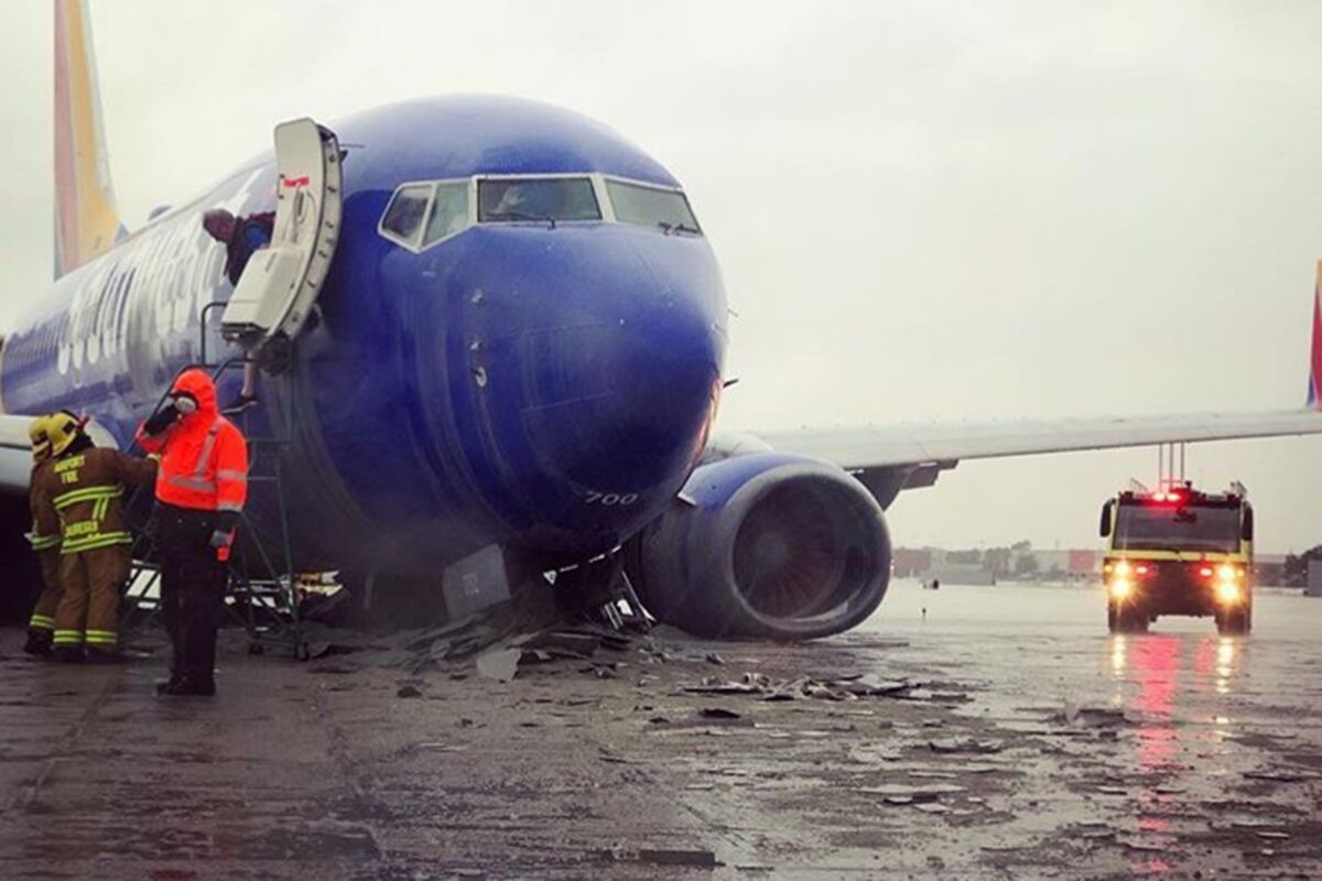 Southwest Jet Skids Off Rainy Runway at California