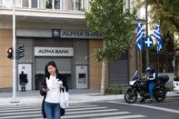 Alpha Bank Branches as Greece Agrees Sale of 9% Stake to UniCredit
