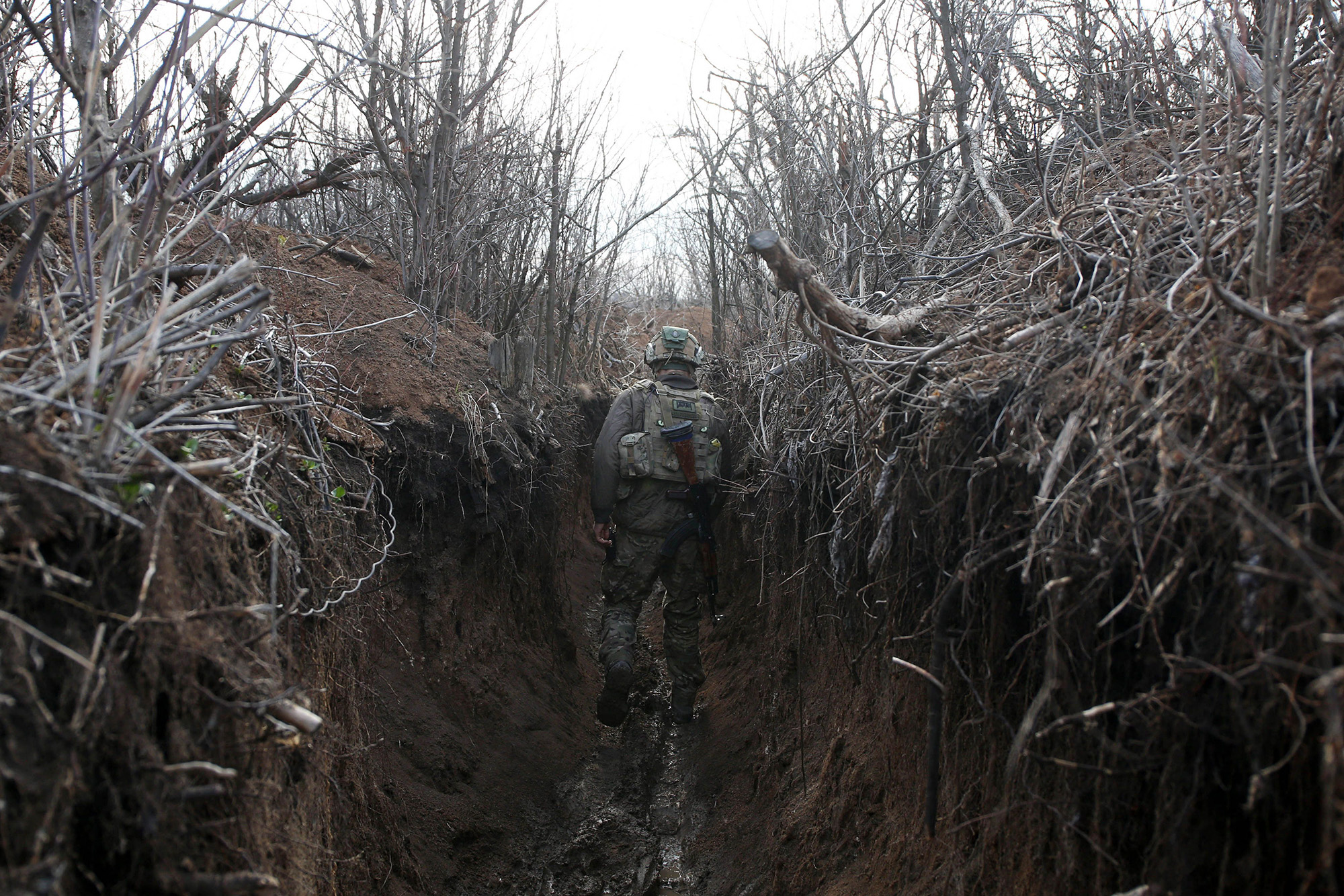 A&nbsp;Ukrainian serviceman walks in a trench&nbsp;on the frontline with Russia backed separatists near the town of Zolote,&nbsp;Ukraine on April 9.&nbsp;
