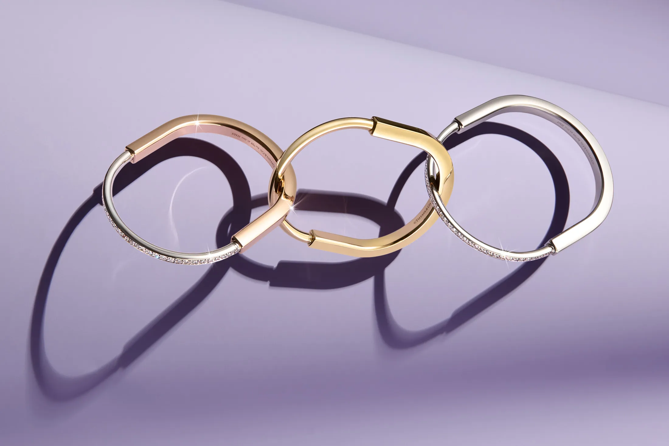 Three versions of Tiffany’s new Lock bracelet.