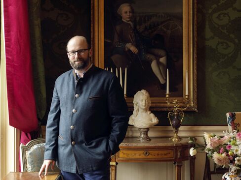 Prince Robert of Luxembourg poses in the Grand Salon at Restaurant Le Clarence in Paris.