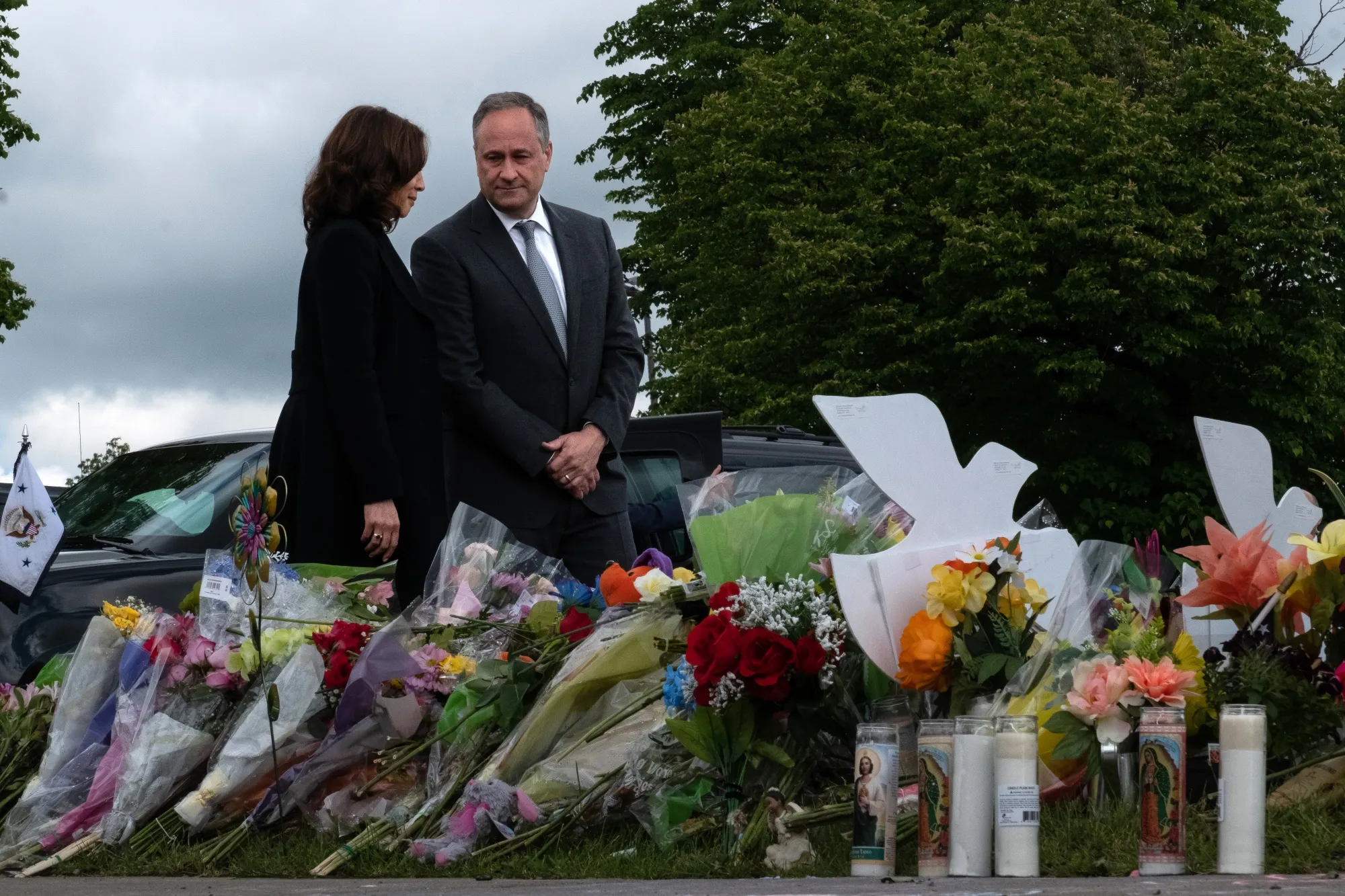 Former US Vice President Kamala Harris, left, and Former Second Gentleman Doug Emhoff attended a  memorial service for mass shooting victims  Buffalo, New York, US, on Saturday, May 28, 2022.