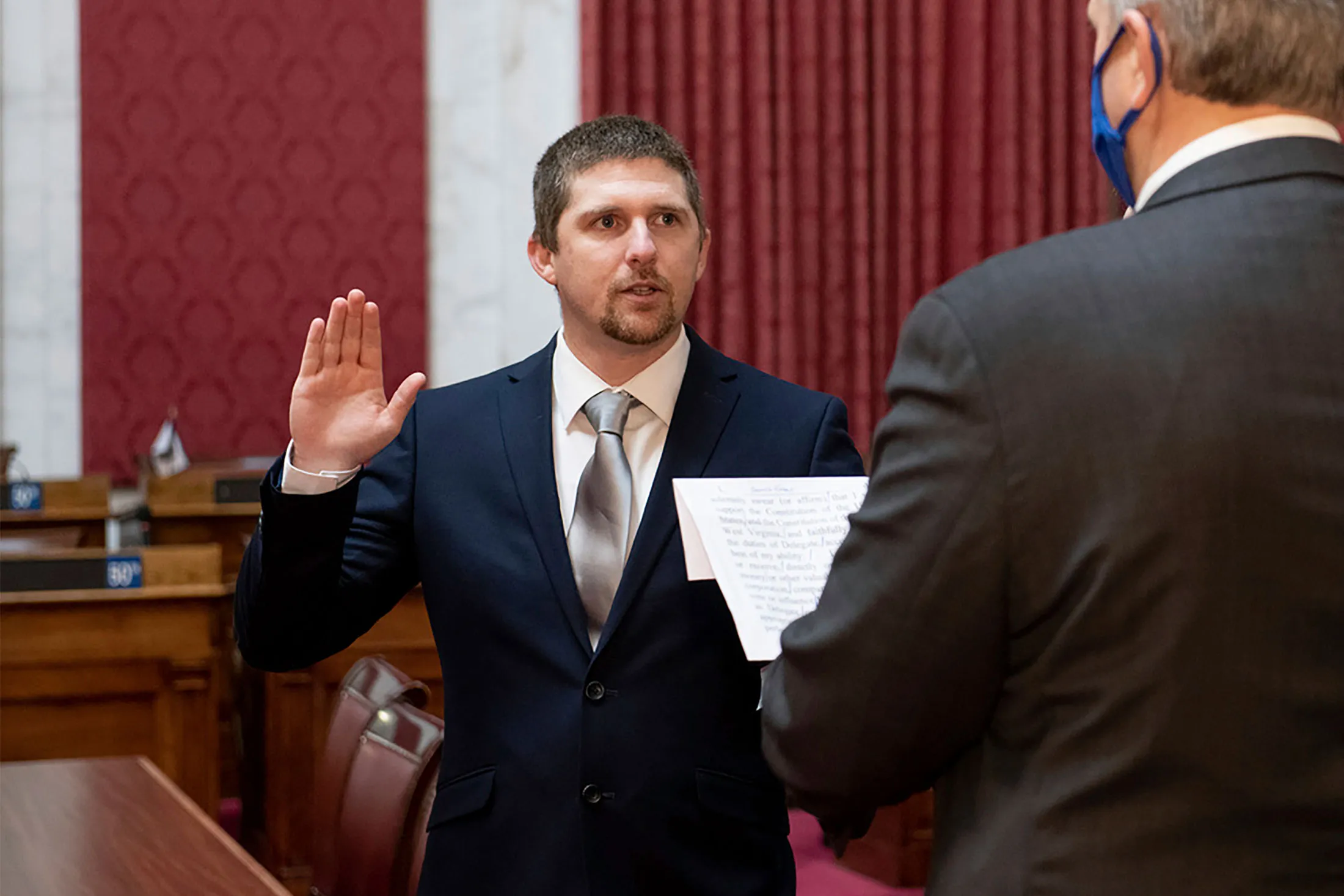 Derrick Evans takes&nbsp;the oath of office at the state Capitol in Charleston, W. Va., on Dec. 14, 2020.&nbsp;