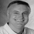 Headshot of John A Olin
