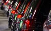 Toyota Motor Corp.'s JPN Taxi vehicles sit parked in a garage during its launch in Tokyo, Japan, on Monday, Oct. 23, 2017. Toyota wants a third of cabs on Tokyo’s streets to be its next-generation taxi by the start of the 2020 Summer Olympics, as it aims to create an icon on par with the yellow cabs of New York and black cabs of London.