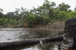 An employee of state-owned Petroecuador working on environmental cleansing operations at a 30-year old oil spillage at Rumipamba commune in 2011