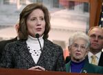 March 25, 2014, then, U.S. Rep. Vicky Hartzler, R-Mo., left, speaks to reporters on Capitol Hill in Washington on March 25, 2014. Senate candidate Vicky Hartzler’s campaign says she has no plans to delete a tweet in which she wrote, “Women’s sports are for women, not men pretending to be women,” even after Twitter said she won’t be able to tweet, retweet, follow or like posts until she does. Twitter on Monday, Feb. 28, 2022, suspended Hartzler’s personal account,  (AP Photo/Lauren Victoria Burke, File)