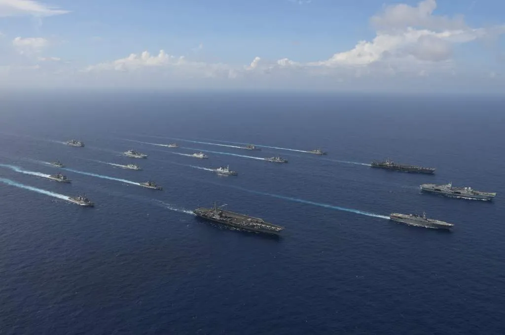 The U.S. Navy, Royal Navy and other naval forces conduct an exercise in the East Philippine Sea.