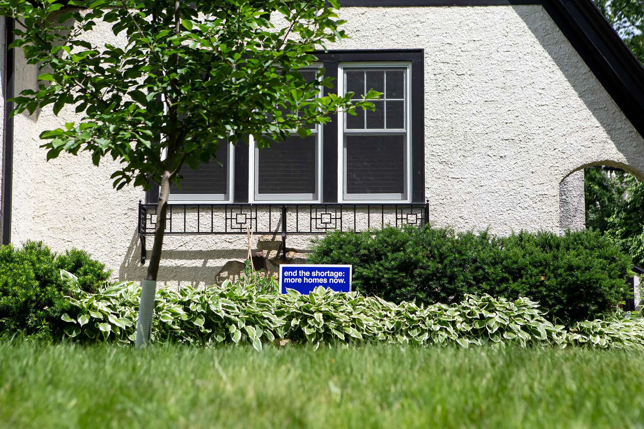 A pro-rezoning lawn sign.