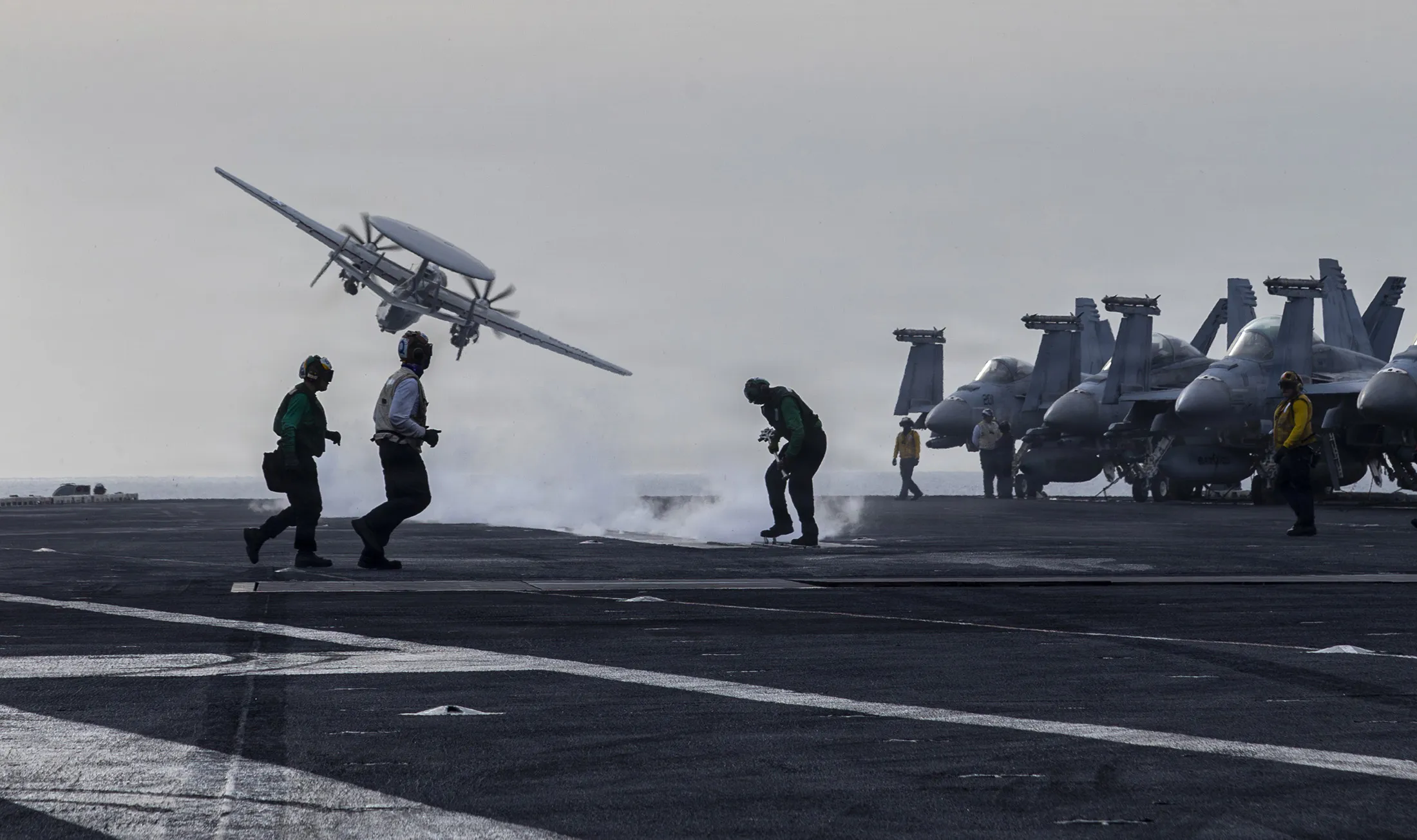 An E-2D Hawkeye launches from the flight deck of Nimitz-class aircraft carrier USS Abraham Lincoln&nbsp;during Operation Epic Fury, in this photo released by the US Navy, on March 31.
