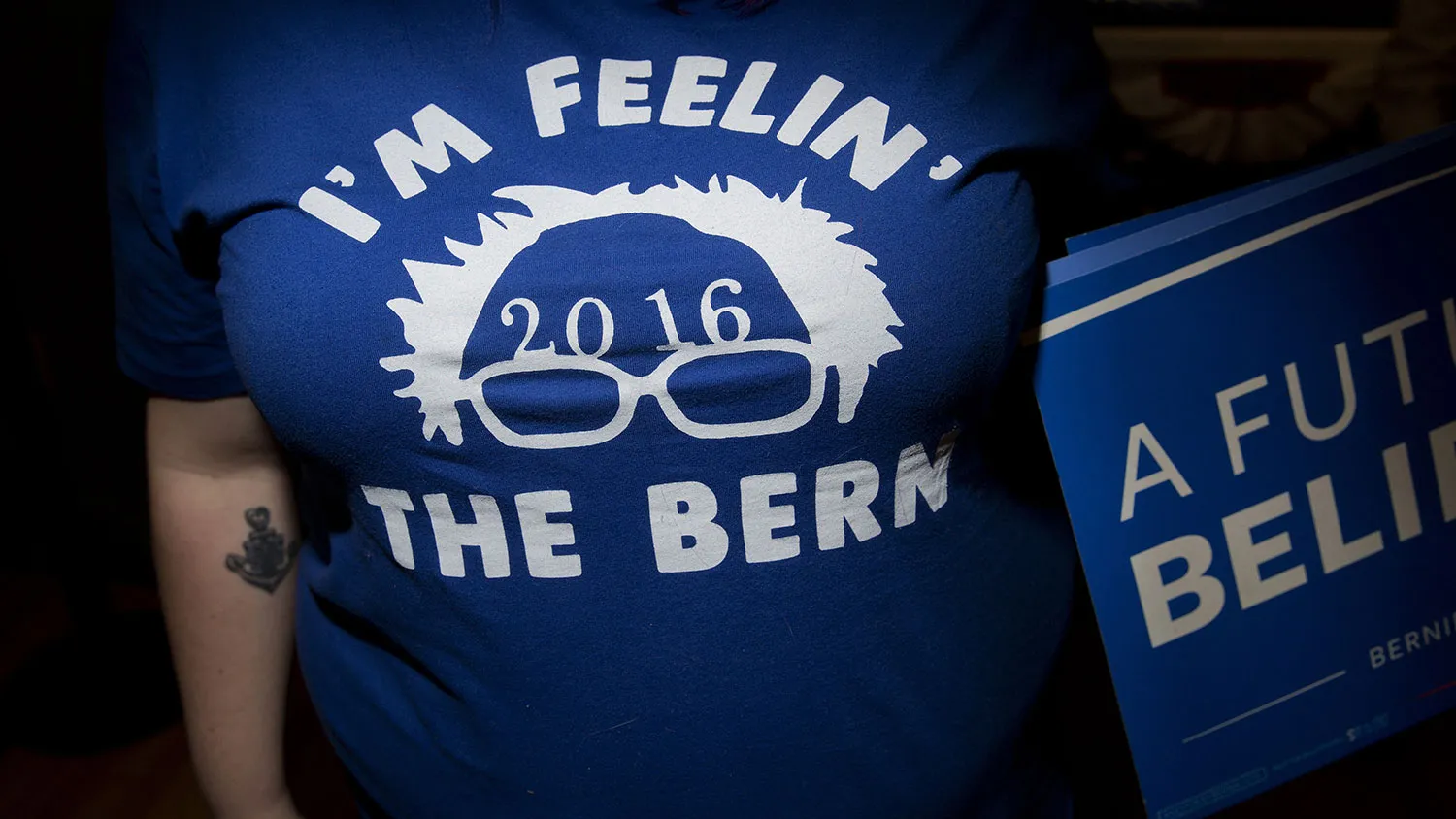 An attendee wears a Bernie Sanders shirt during a campaign event in Exeter, New Hampshire, on Feb. 5, 2016.
