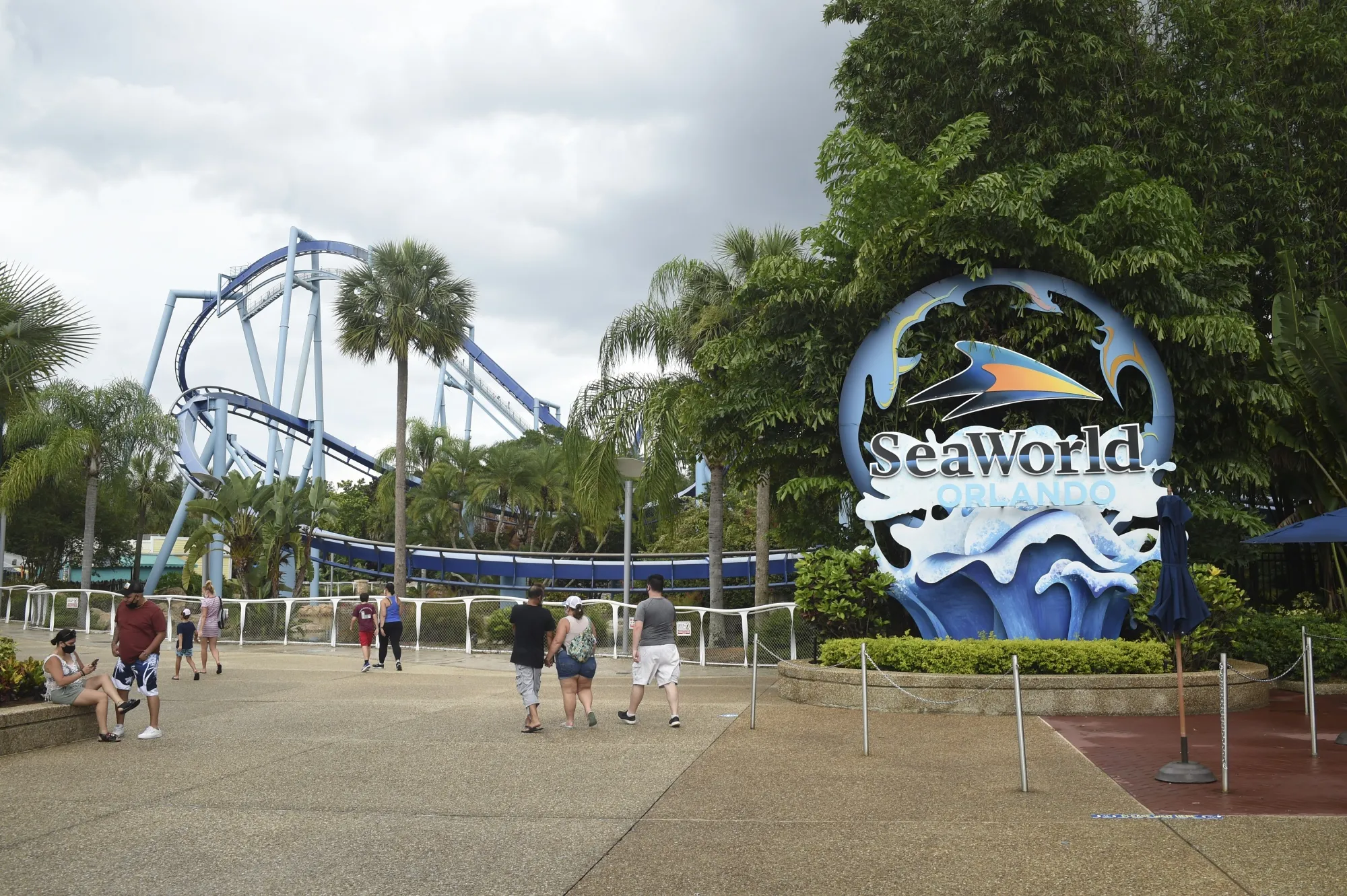 Visitors enter the SeaWorld amusement park in Orlando, Florida.