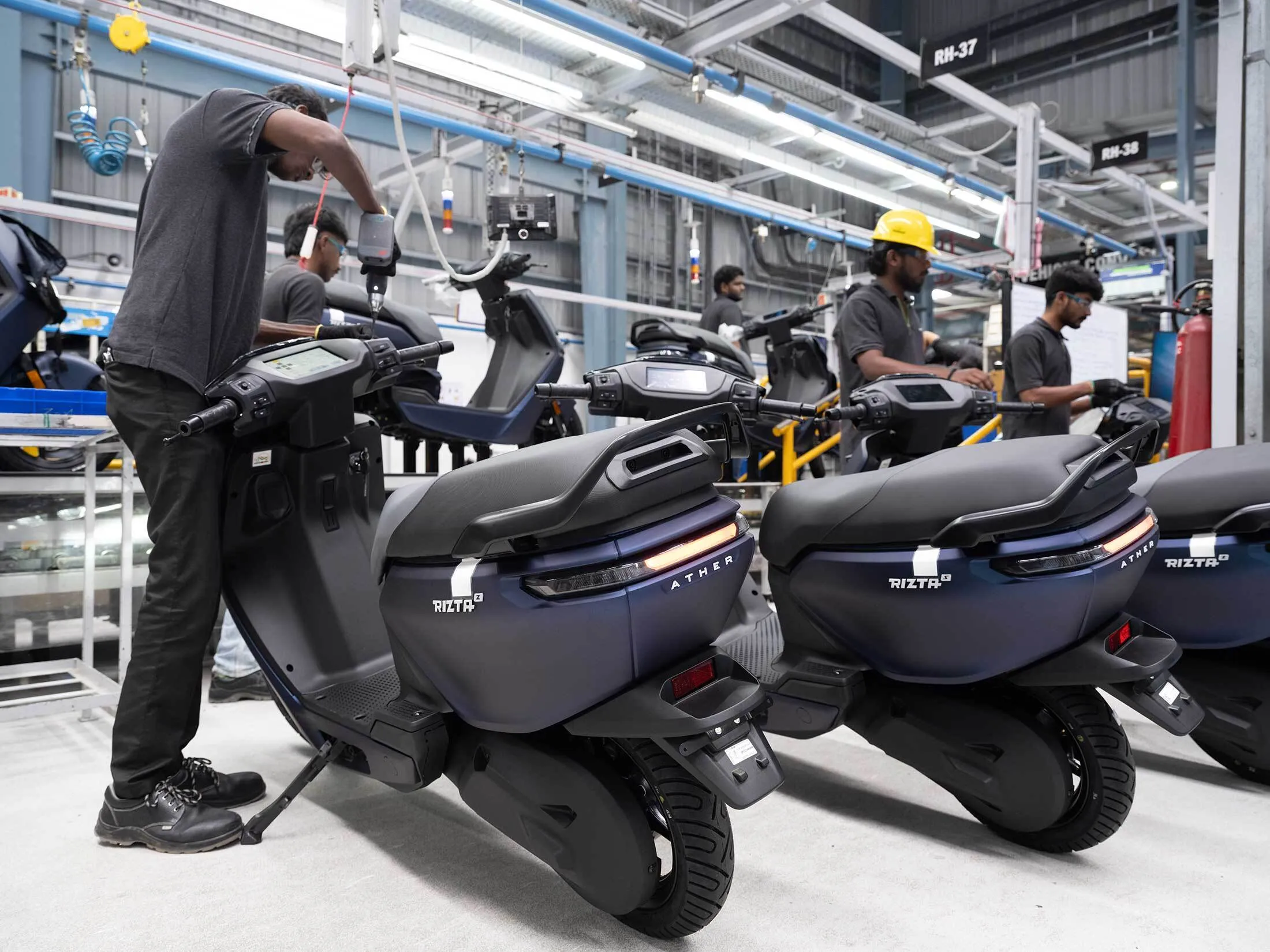 Putting the finishing touches on Ather scooters at the company’s factory in Hosur, Tamil Nadu.