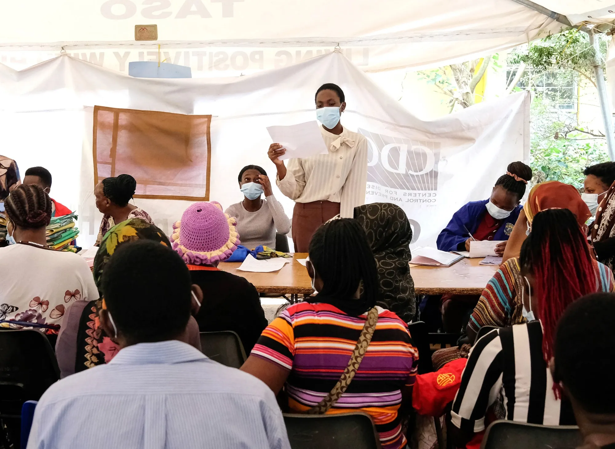 A counsellor&nbsp;speaks to clients during an HIV clinic day in Kampala, Uganda, on&nbsp;Feb. 17.