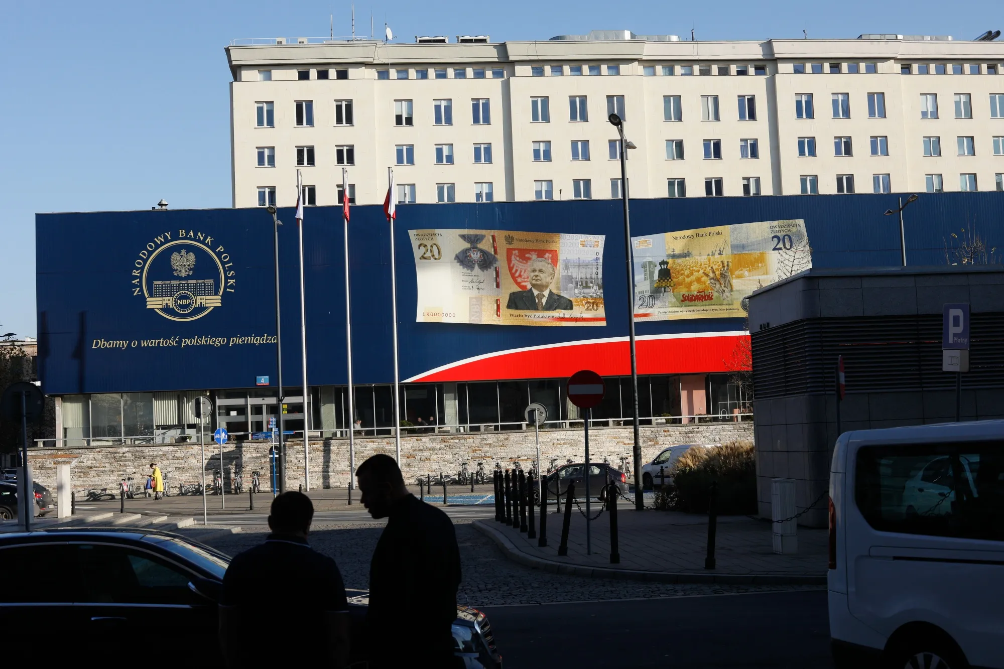 A banner commemorating a new 20 Zloty banknote outside Poland's Central Bank.&nbsp;