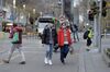 Pedestrians wearing protective masks cross an intersection in Melbourne, Australia, on Thursday, July 23, 2020. The spike in Victoria has forced around 5 million people in Melbourne back into a six-week lockdown. The shutdown of the nation's second-biggest city, which contributes about one-quarter of gross domestic product, could prolong the nation's first recession in almost three decades.