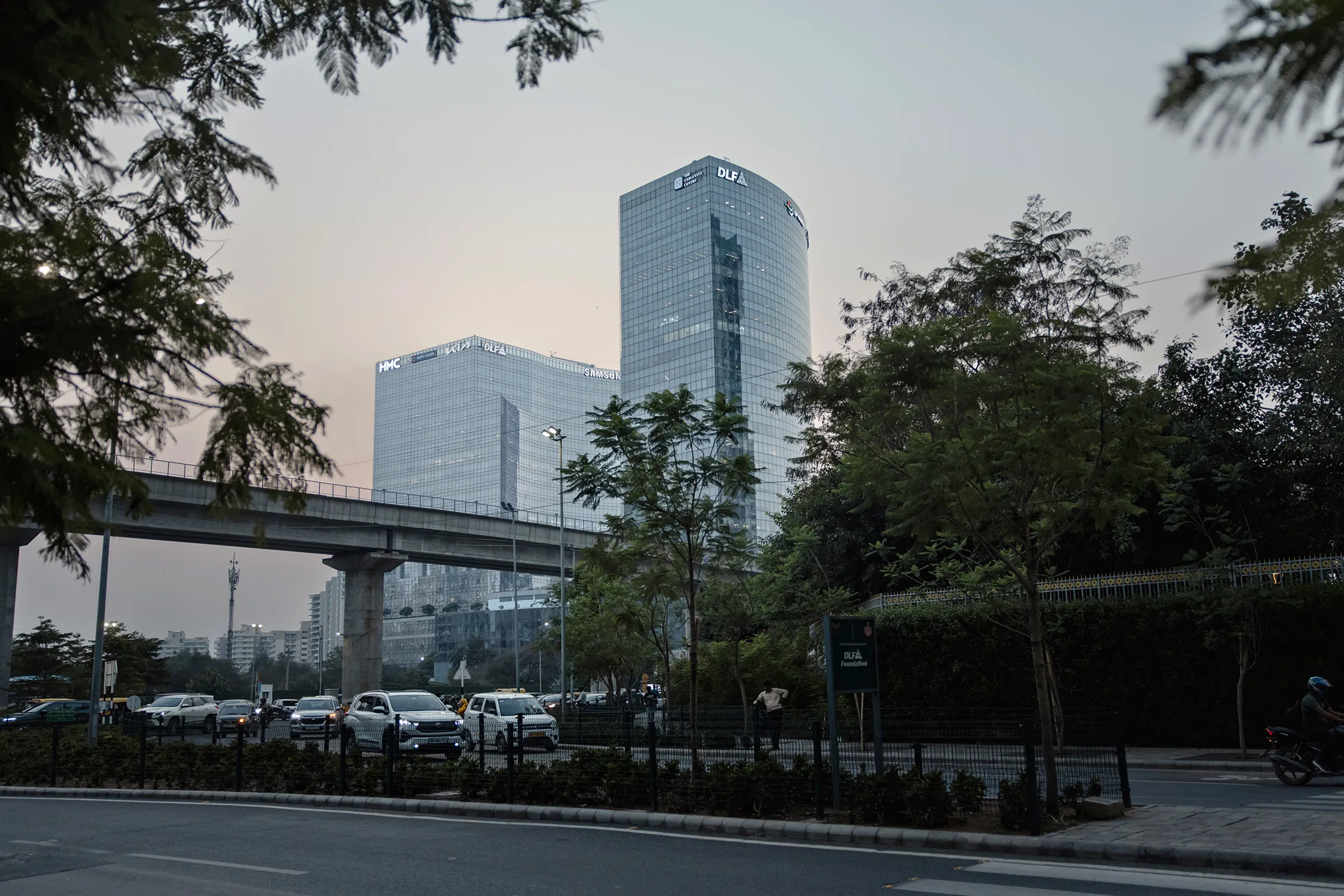 A cluster of trading giants operate out of a large curved tower called Two Horizon Center in&nbsp;Gurugram, India.