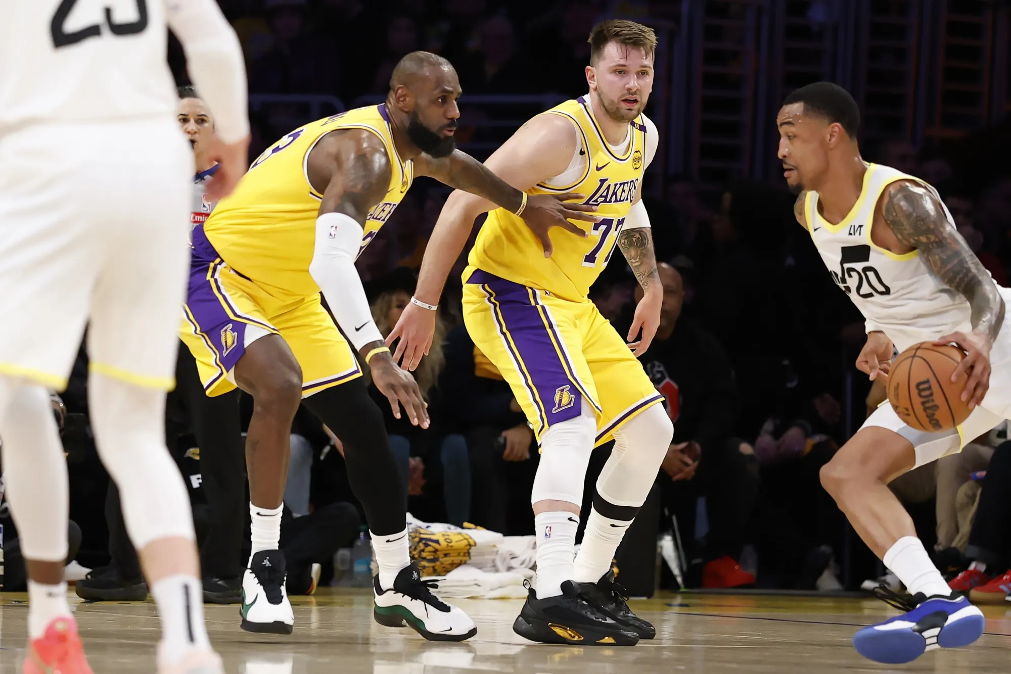 Luka Doncic, center, and LeBron James, left during the game against the Utah Jazz&nbsp; in Los Angeles, California, on Feb. 10.