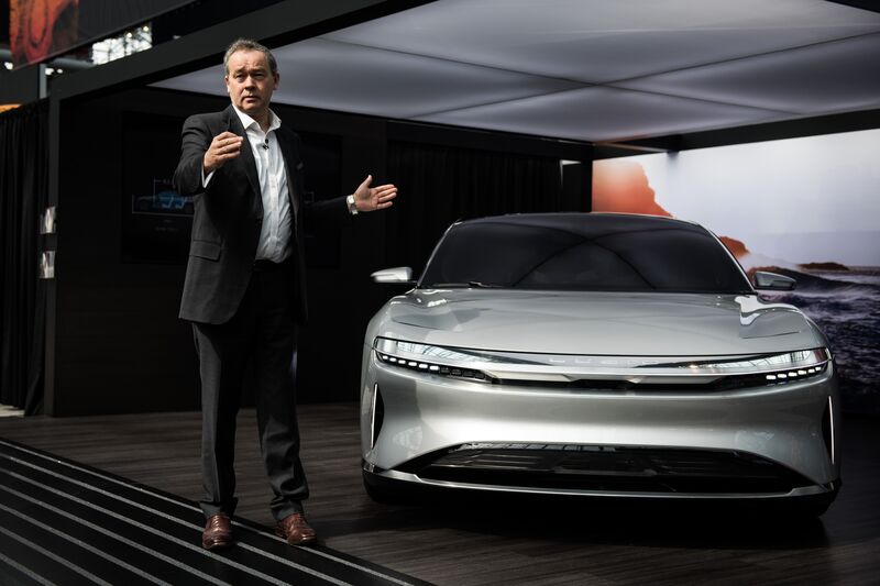 Lucid CEO Peter Rawlinson with a Lucid Air prototype.