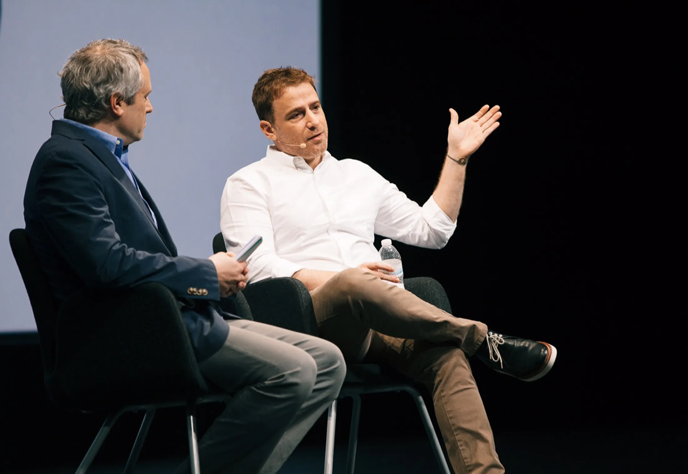 Slack CEO Stewart Butterfield, right, talks  during an onstage interview at the Bloomberg Businessweek Design Conference on April 11.
