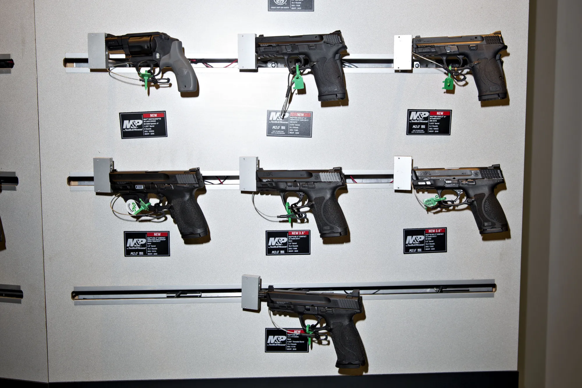Pistols sit on display in the Smith &amp; Wesson Corp. booth during the NRA annual meeting in Dallas.