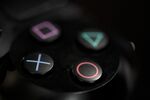 The buttons of a Sony PlayStation 4 controller.
