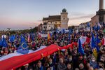 Participants take part in a pro-EU demonstration following a ruling of the Constitutional Court against the primacy of EU law in Poland, in Warsaw on Oct. 10.