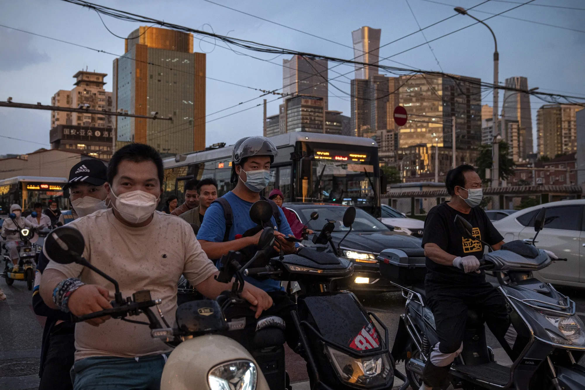 Motorists wait at a traffic signal light in Beijing, China, on Tuesday, Aug. 30, 2022.&nbsp;