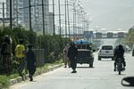 Taliban fighters near the Russian embassy following an explosion, in Kabul on Sept. 5.