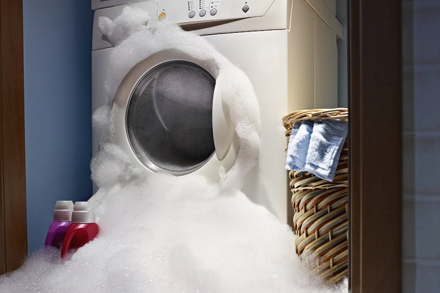 How is a suds-saver washing machine more efficient than a normal washing machine?