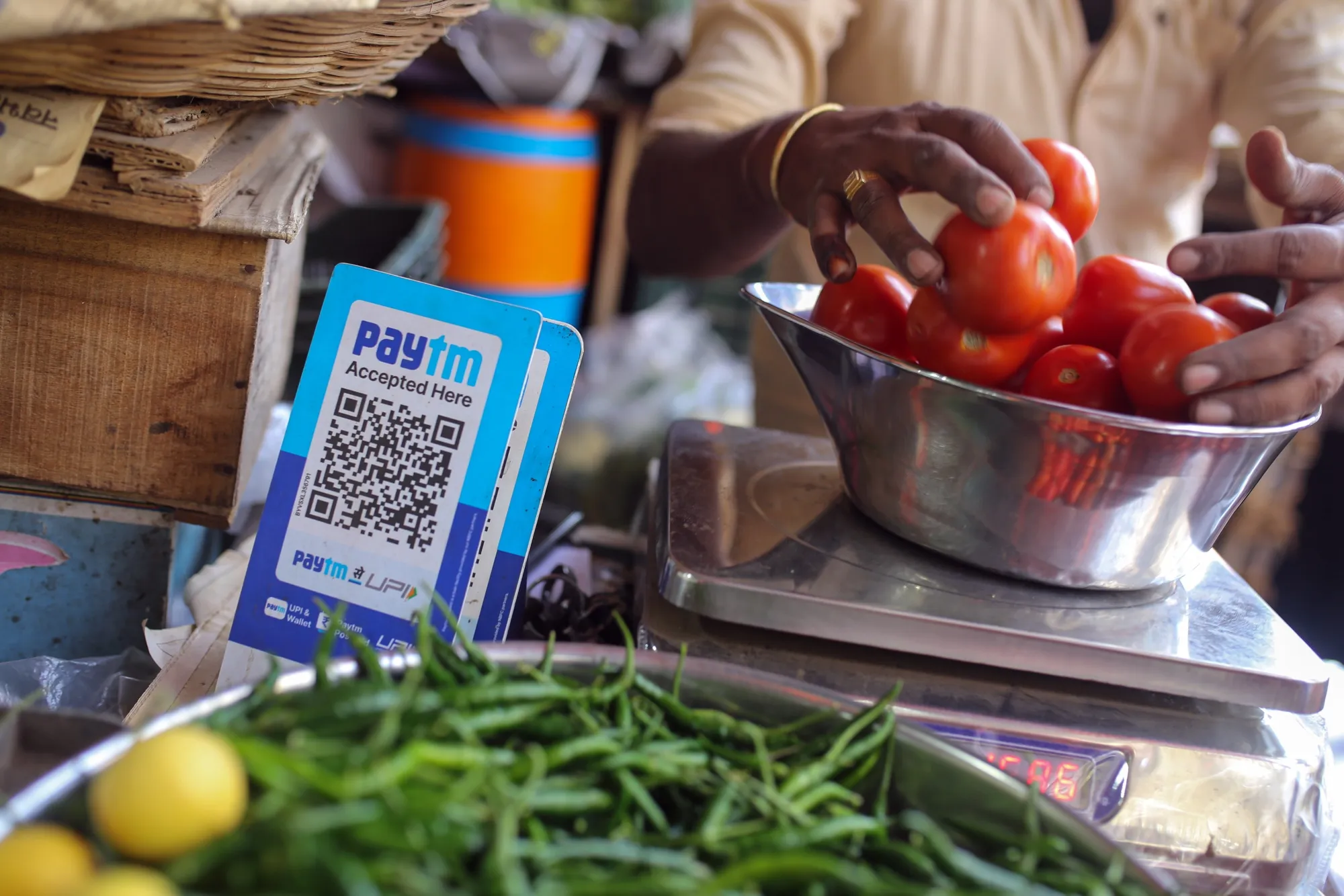 A QR code for the Paytm digital payment system at a roadside vegetables stall in Mumbai, India.