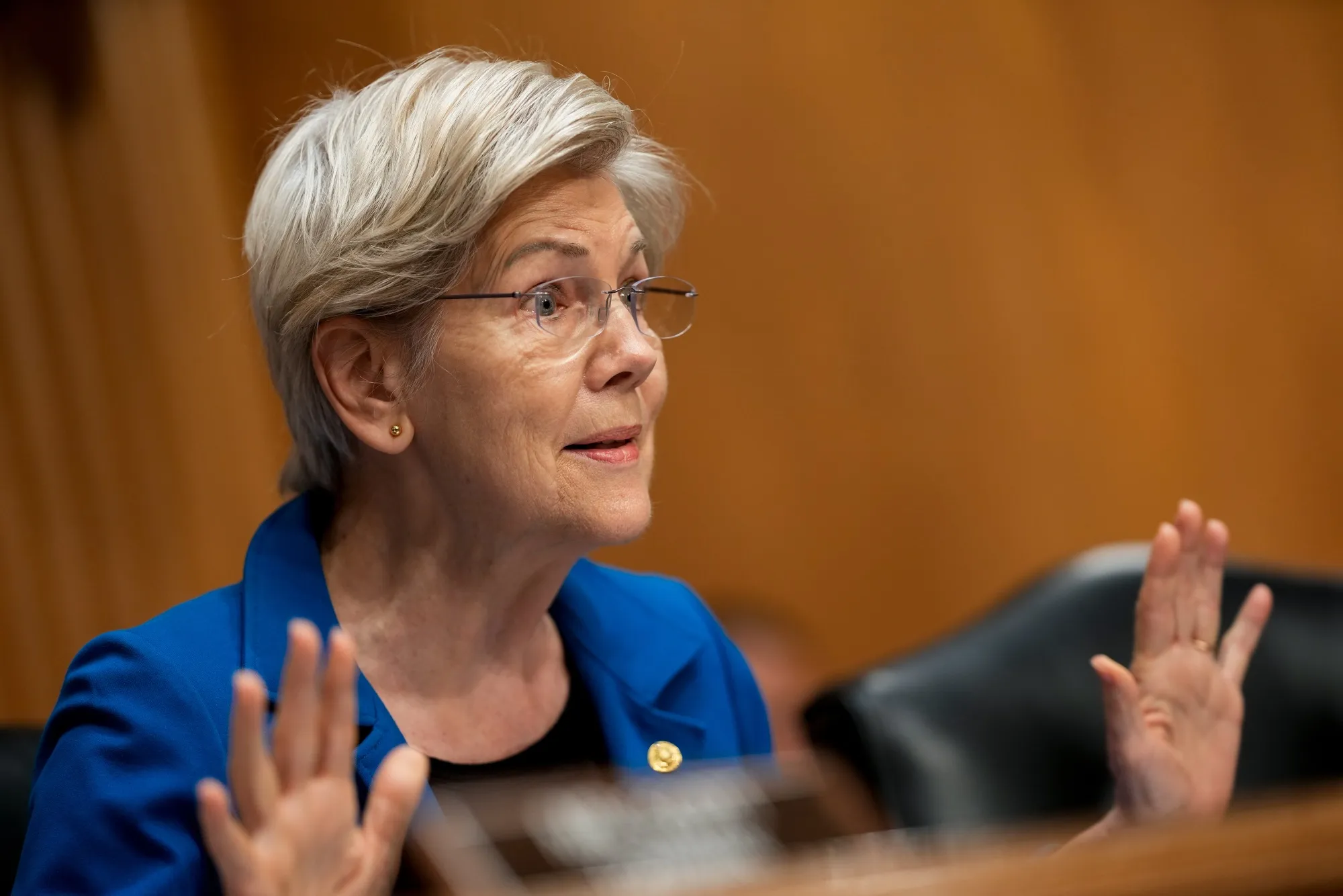 Senator Elizabeth Warren co-signed a letter to top Trump administration officials expressing concern that recent AI deals in the Mideast.